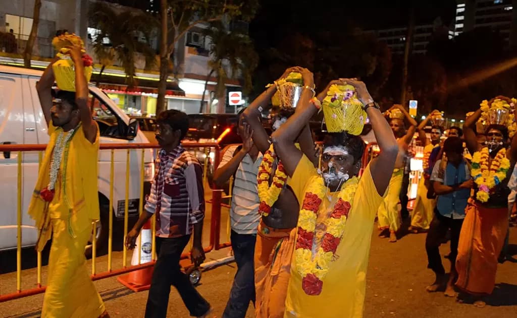 Why Kavady Devotees Wear Yellow?