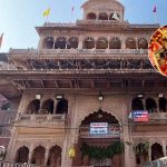 A sacred moment captured during the historic reopening of the Banke Bihari Temple treasury in Vrindavan on October 18, 2025, showcasing the entrance to the Toshkhana with ritual items and security personnel, set against the templeβs ornate architecture on the auspicious occasion of Dhanteras.