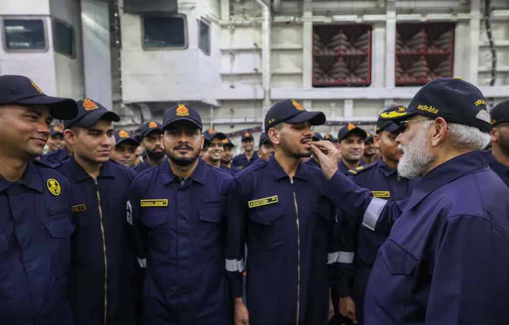 PM Modi with Indian Navy personnel during Diwali celebrations aboard INS Vikrant