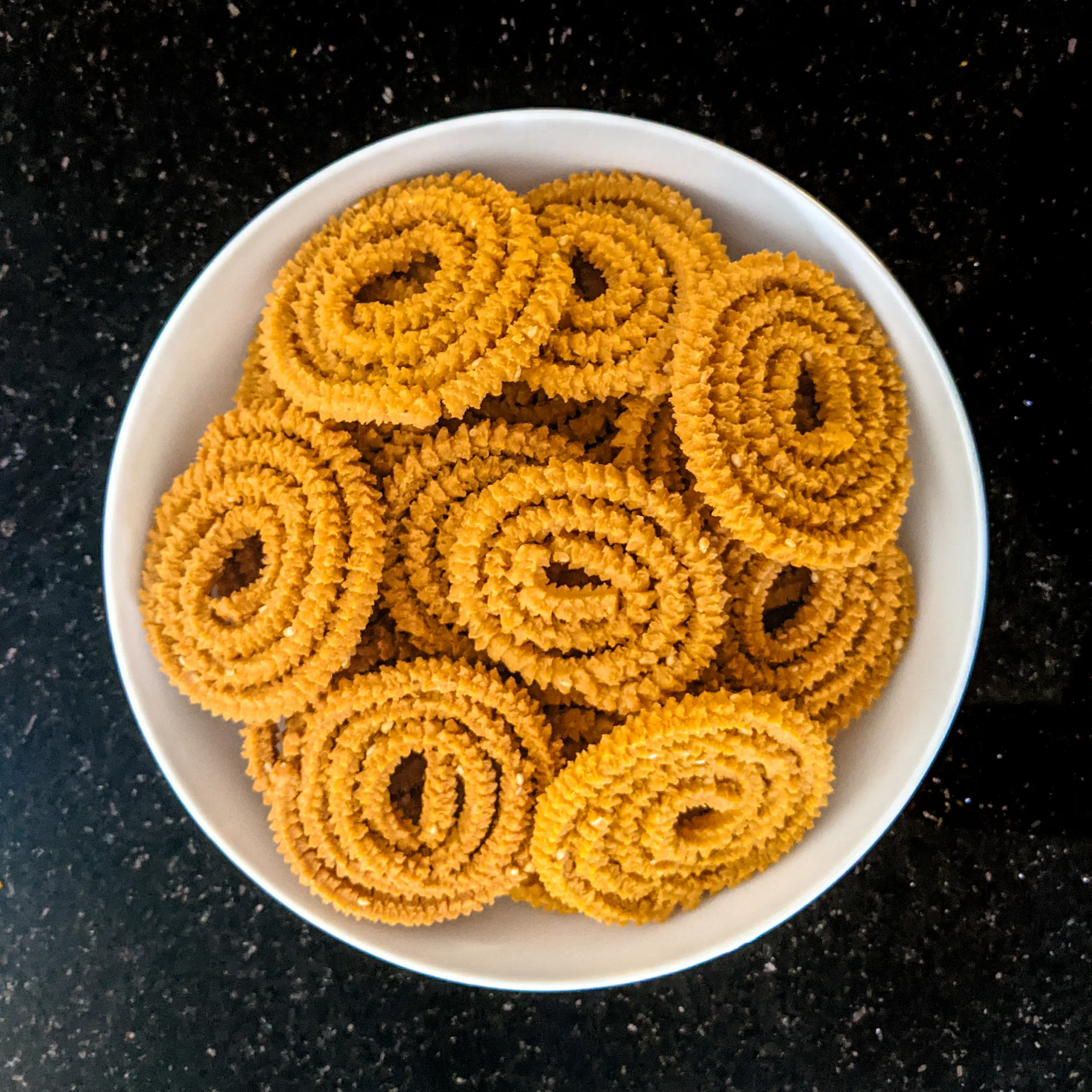 Maharashtrian Diwali Faral 2026: Bhajani Chakli, Shankarpali, Karanji and Besan Ladoo — Recipes